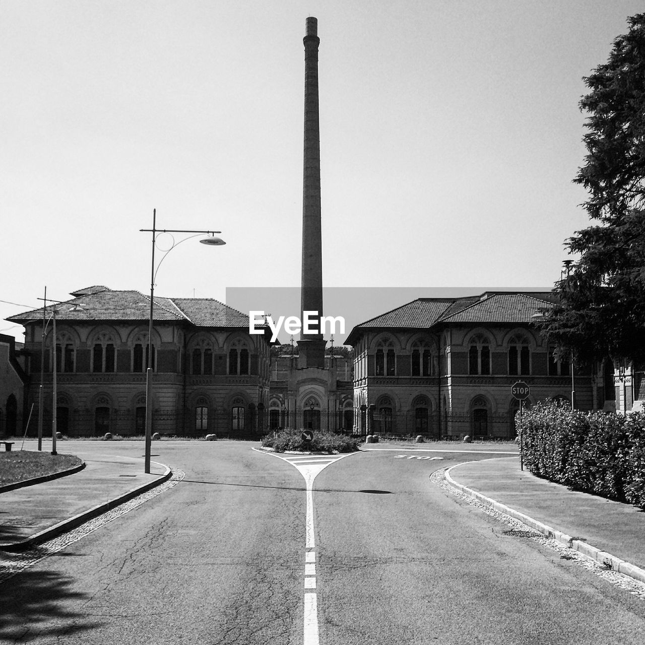 VIEW OF EMPTY ROAD ALONG BUILDINGS