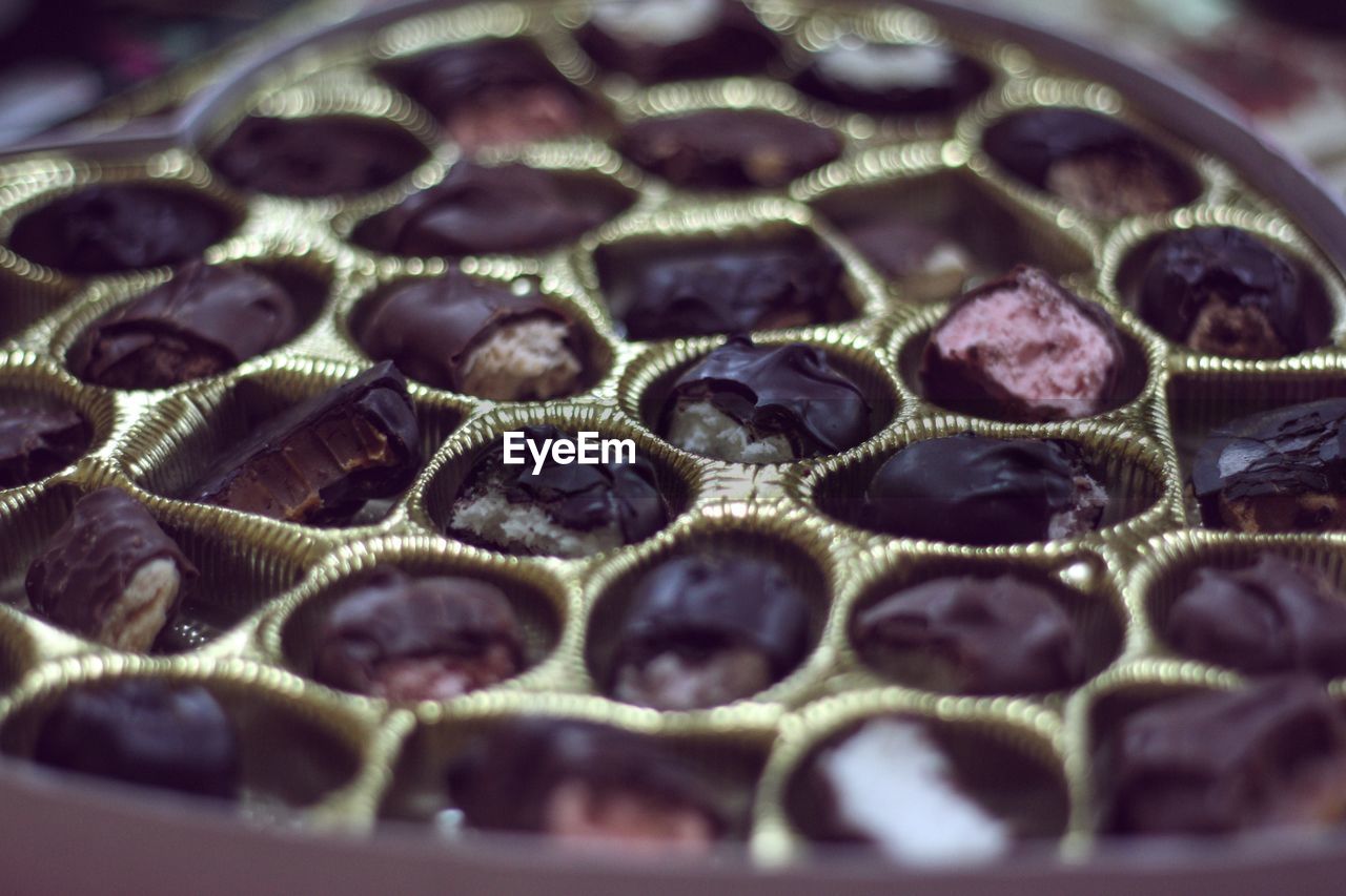 Close-up of half eaten chocolates