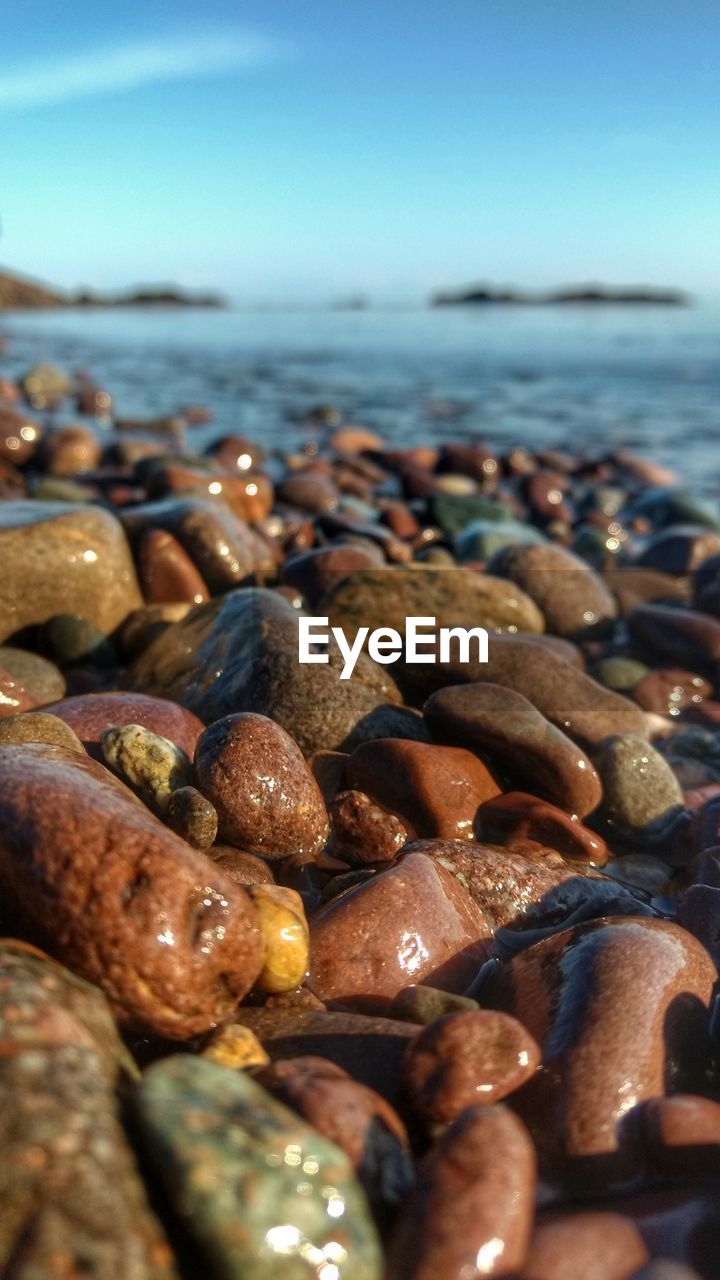 Close-up of pebbles on beach