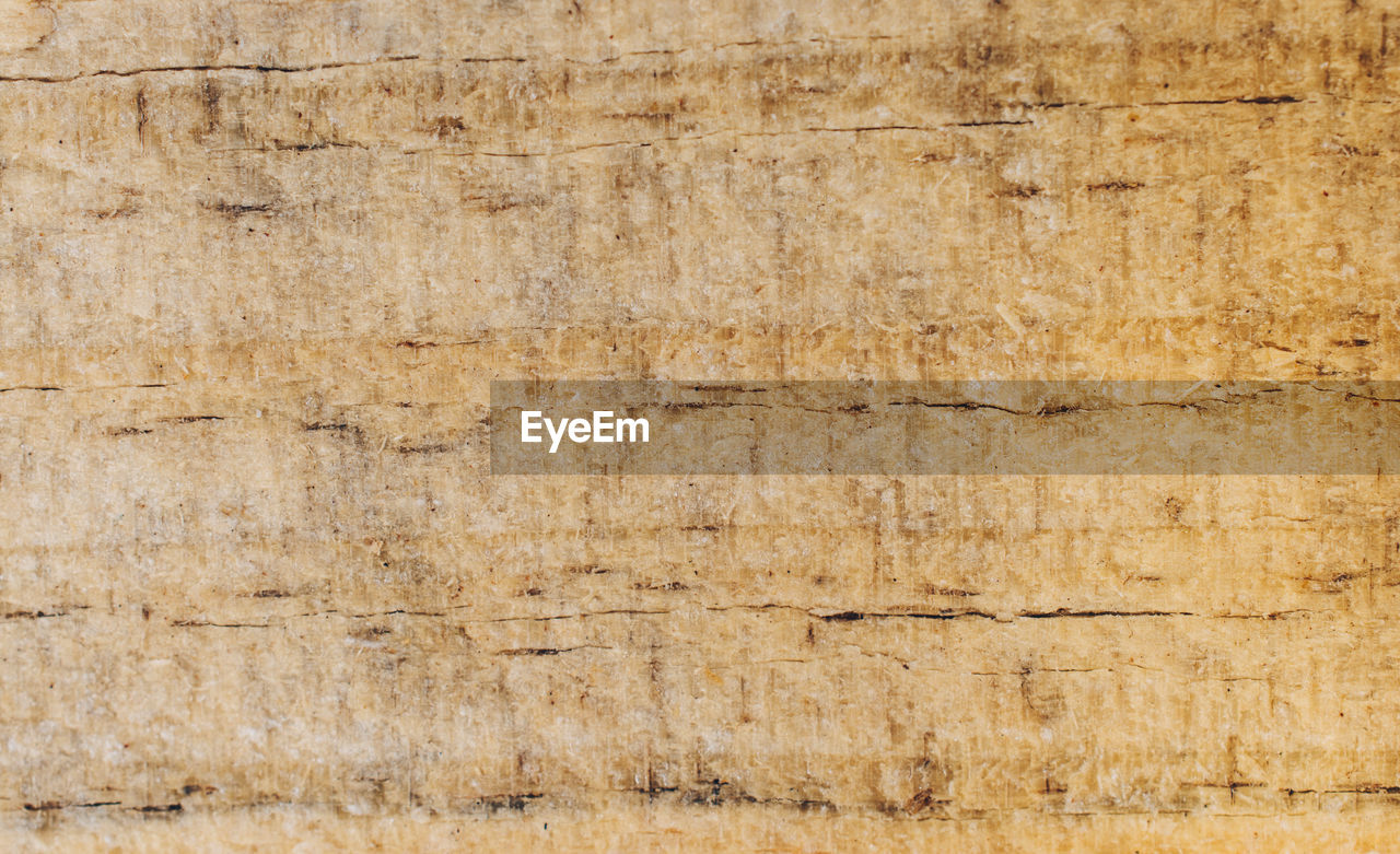 FULL FRAME SHOT OF WEATHERED WOOD