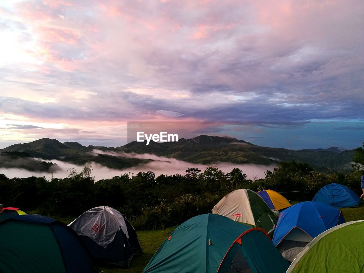 Scenic sea of clouds and pink sky at the camp site