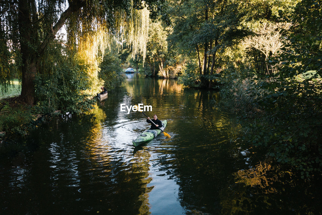 High angle view of man kayaking in river