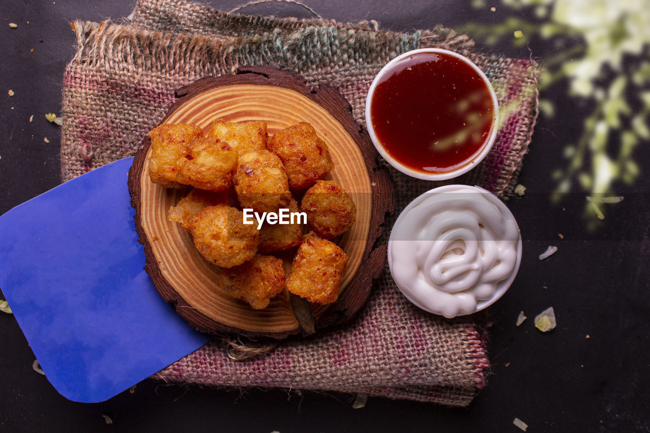 food and drink, food, sweet food, dish, freshness, no people, fast food, snack, sweet, unhealthy eating, baked, sweetness, dessert, meal, produce, high angle view, still life, temptation, table, asian food