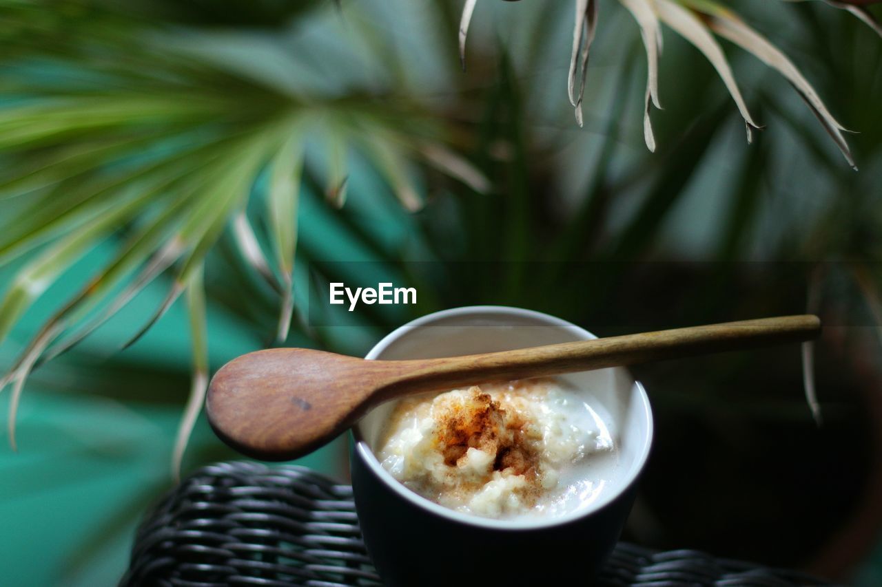 Close-up of sweet food in cup on table