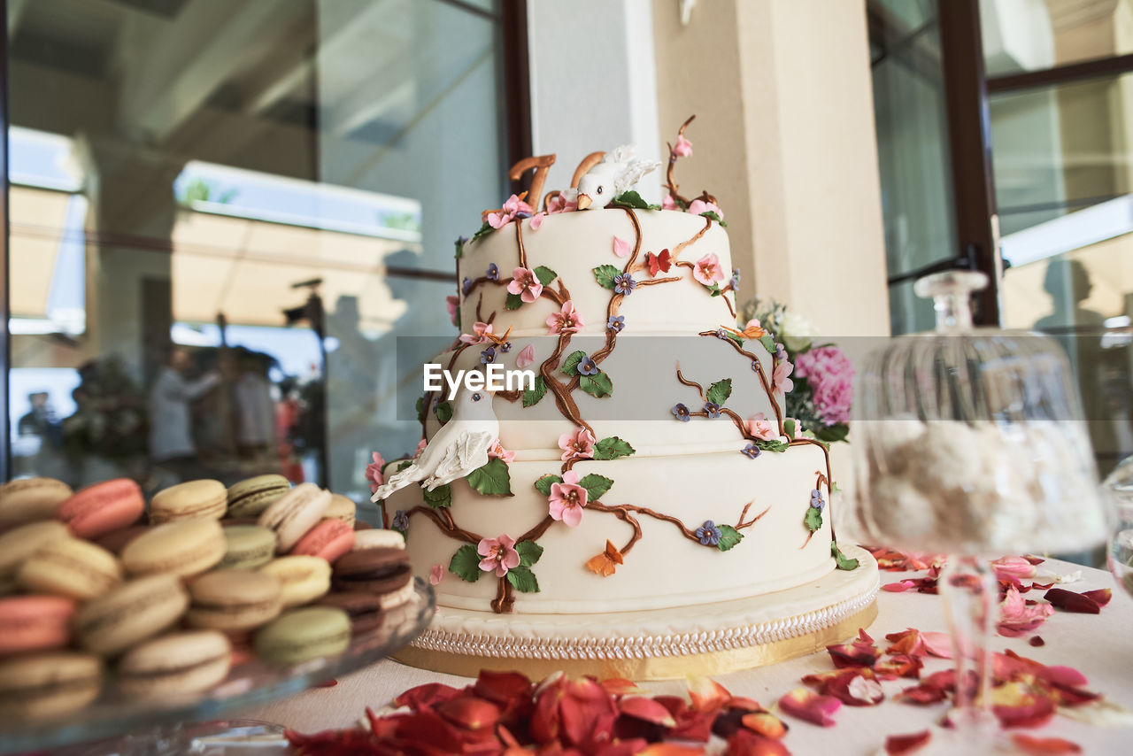 HIGH ANGLE VIEW OF CAKE FOR SALE IN SHOP