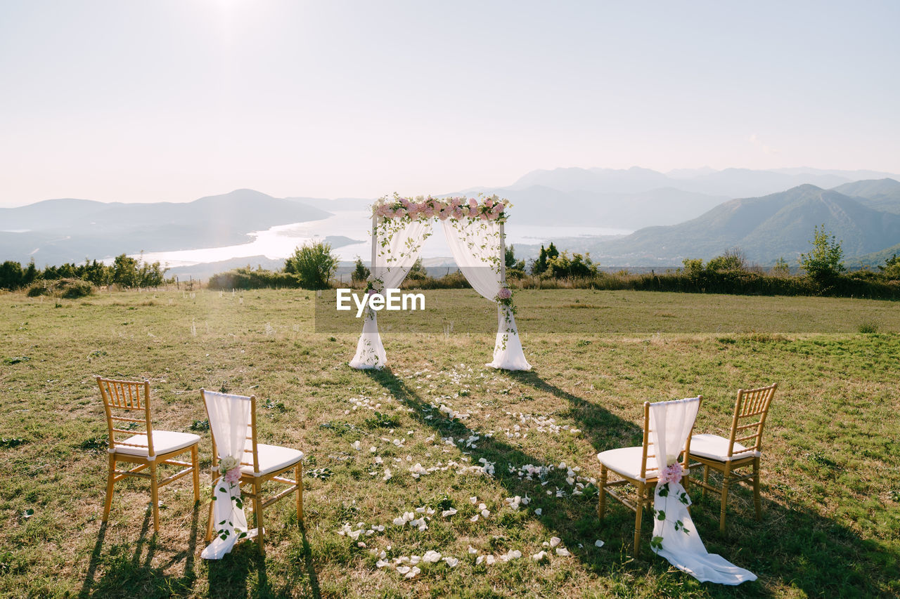 scenic view of field against sky during sunset