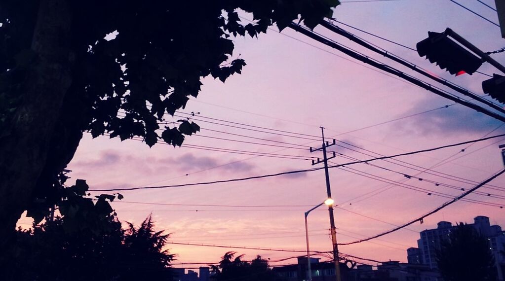 LOW ANGLE VIEW OF ELECTRICITY PYLONS AGAINST SKY