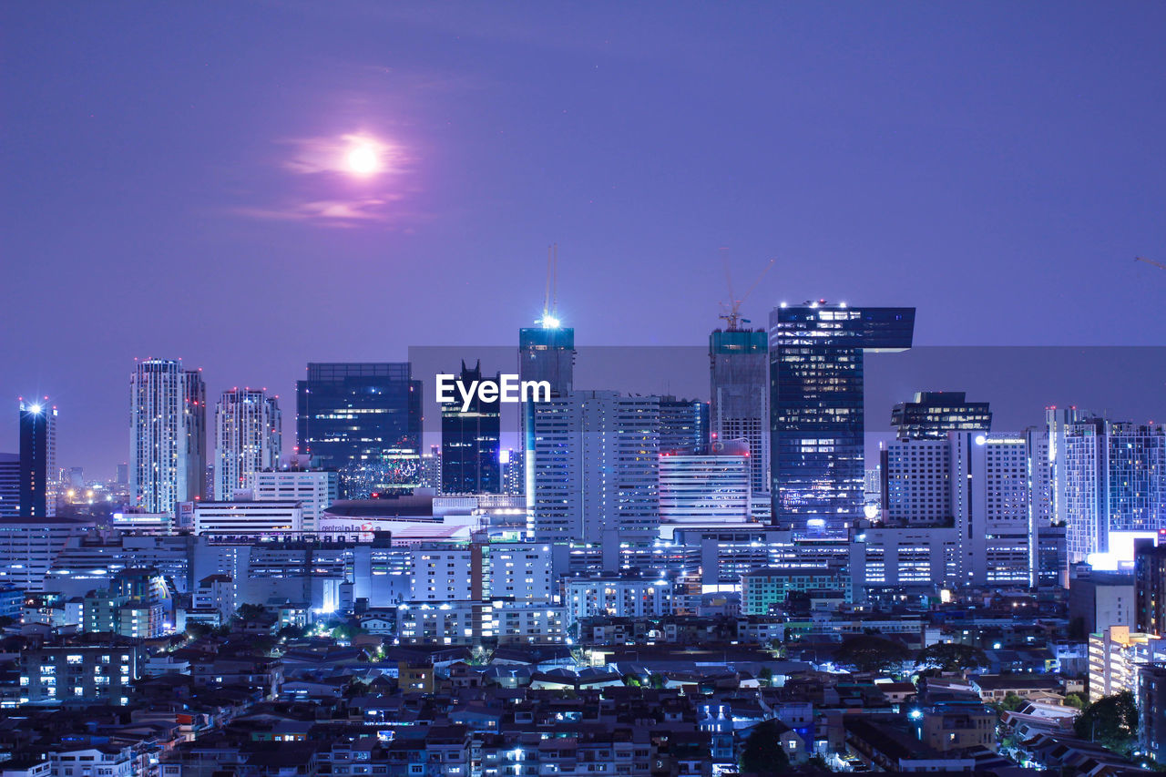 Cityscape of bangkok thailand with the moon