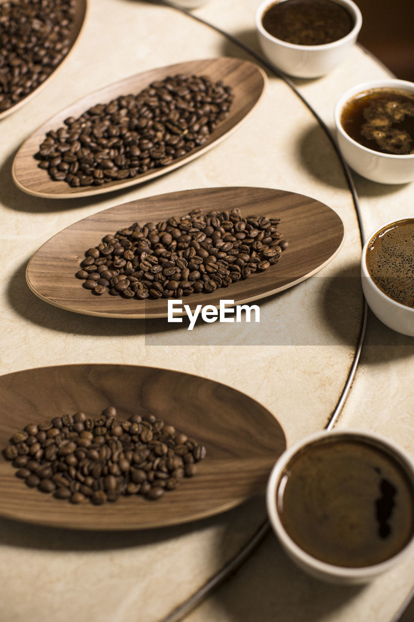 Close-up of coffee beans on table