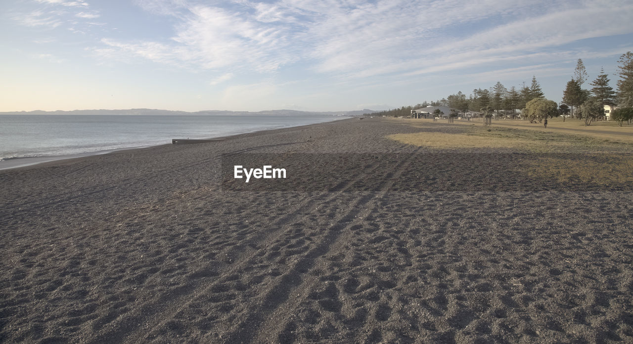 VIEW OF BEACH AGAINST SKY