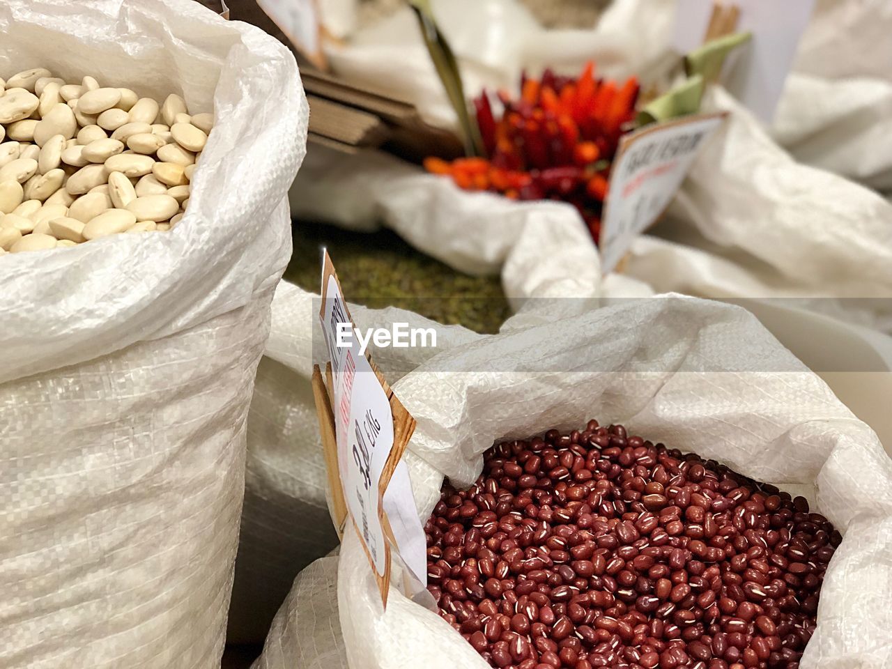 High angle view of beans in sack for sale