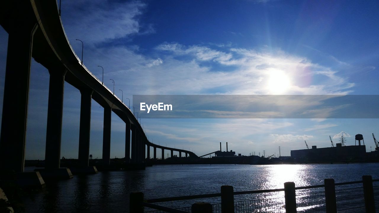 Low angle view of south norfolk jordan bridge over river against sky