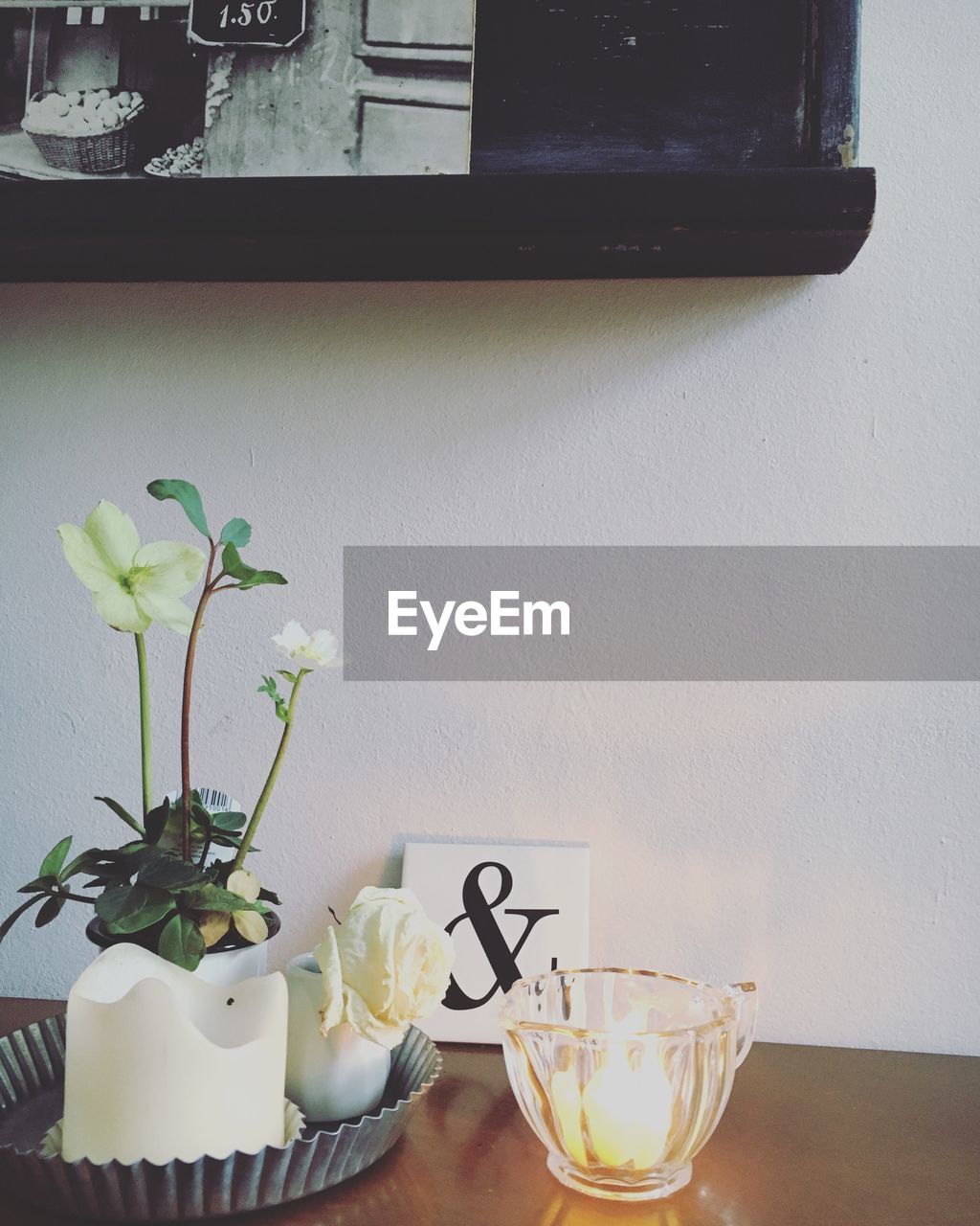 FLOWER VASE ON TABLE IN KITCHEN