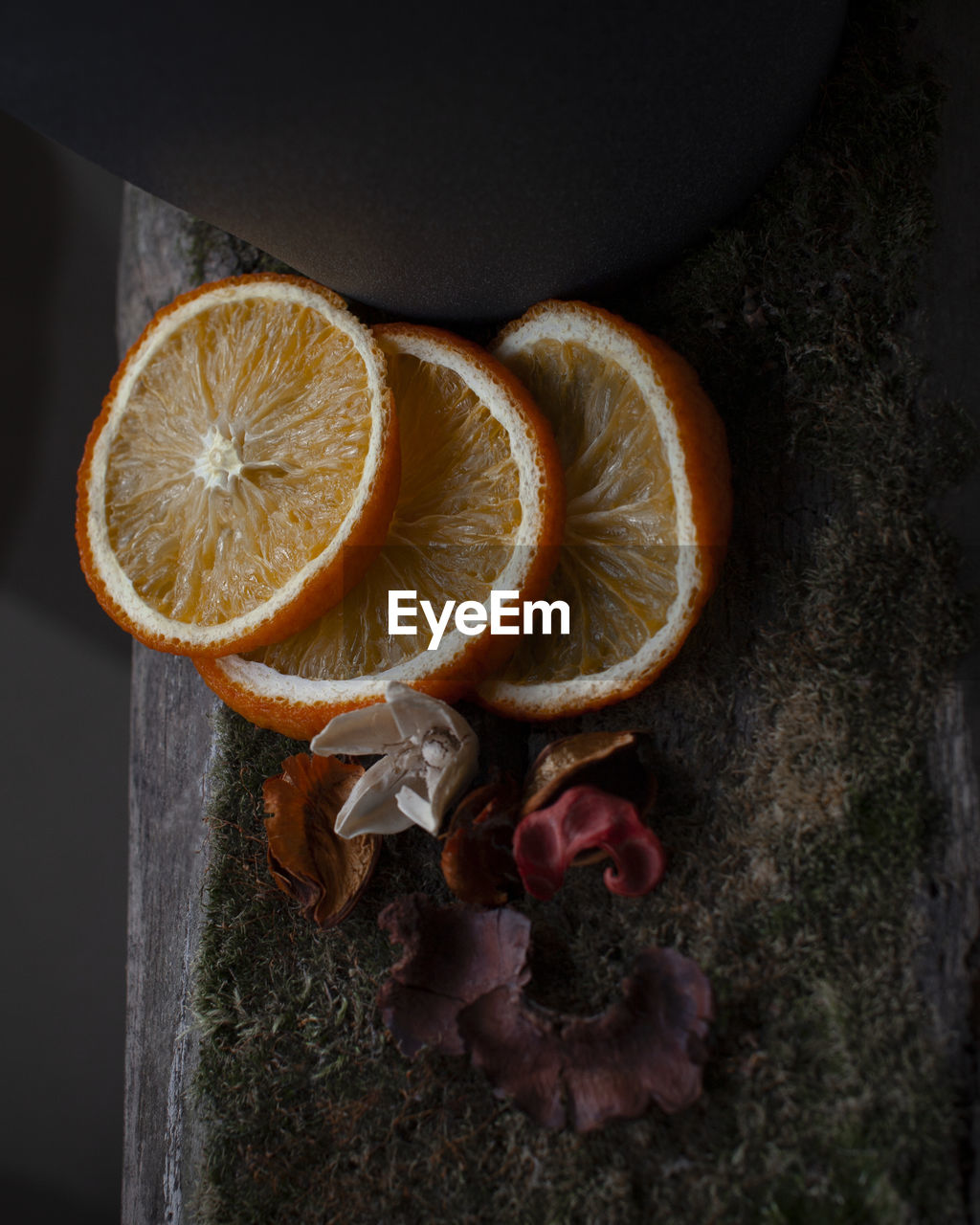 Close-up of orange fruit on wood