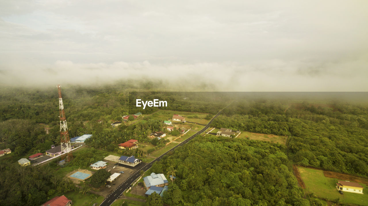 High angle view of a village during misty morning. 