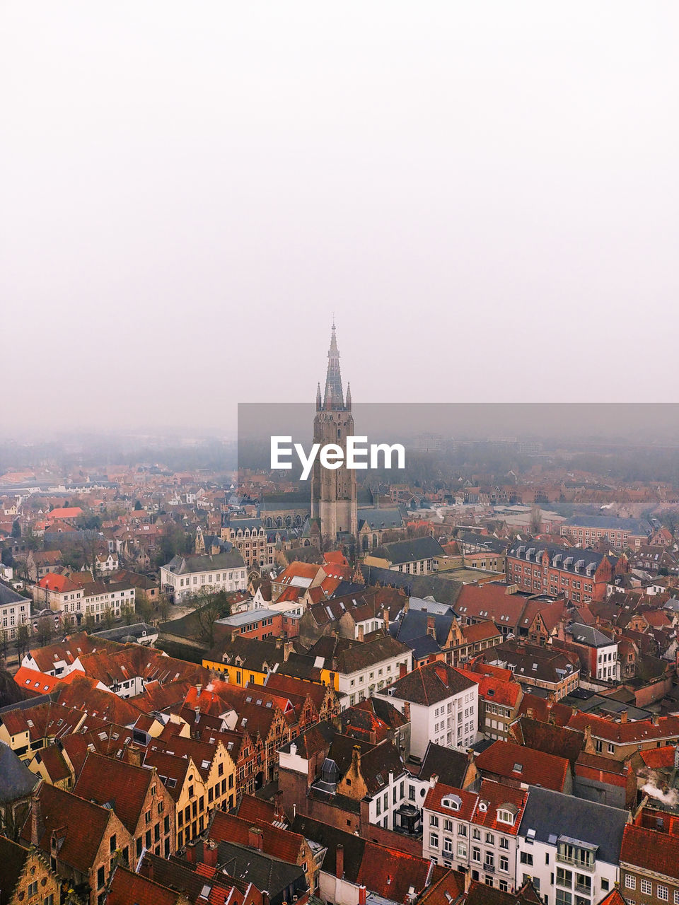 High angle view of buildings in city against sky