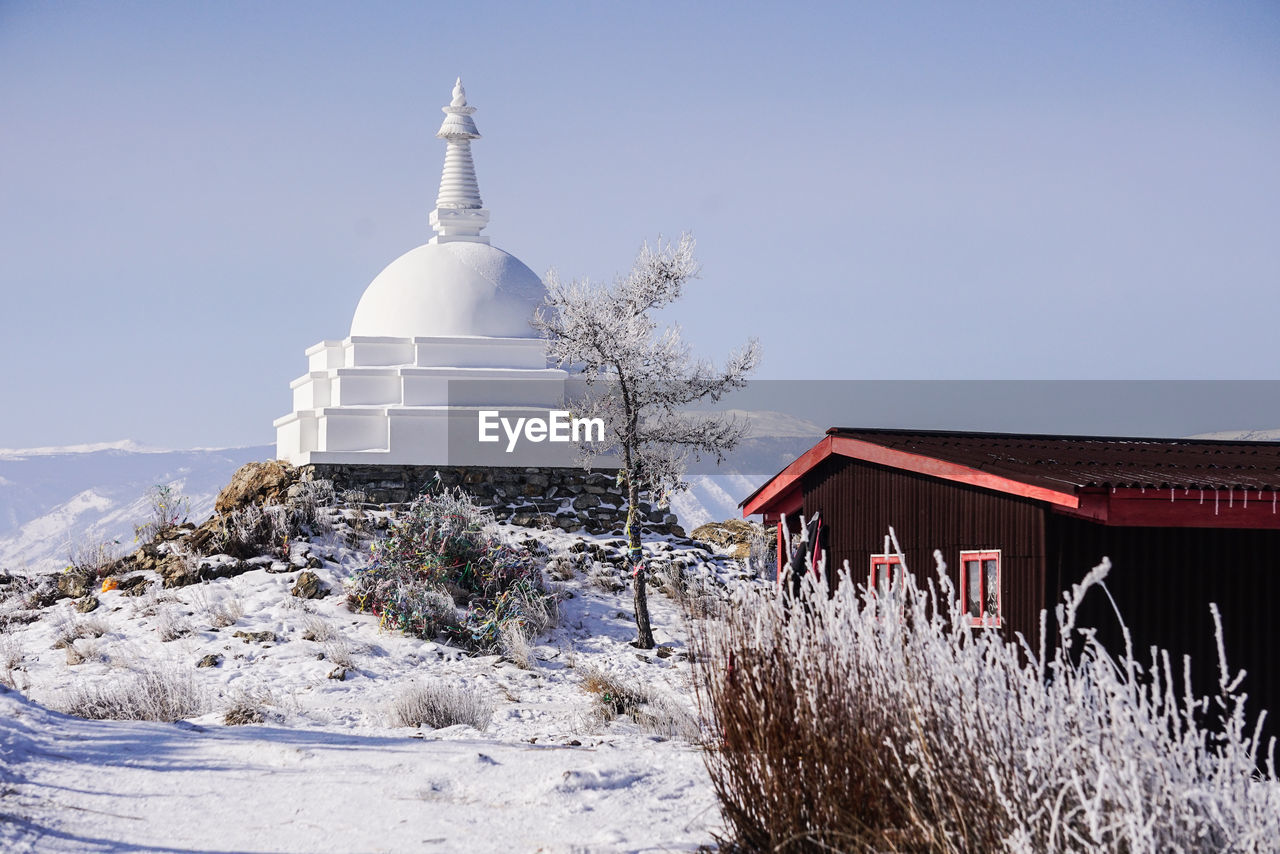 BUILDING AGAINST SKY DURING WINTER