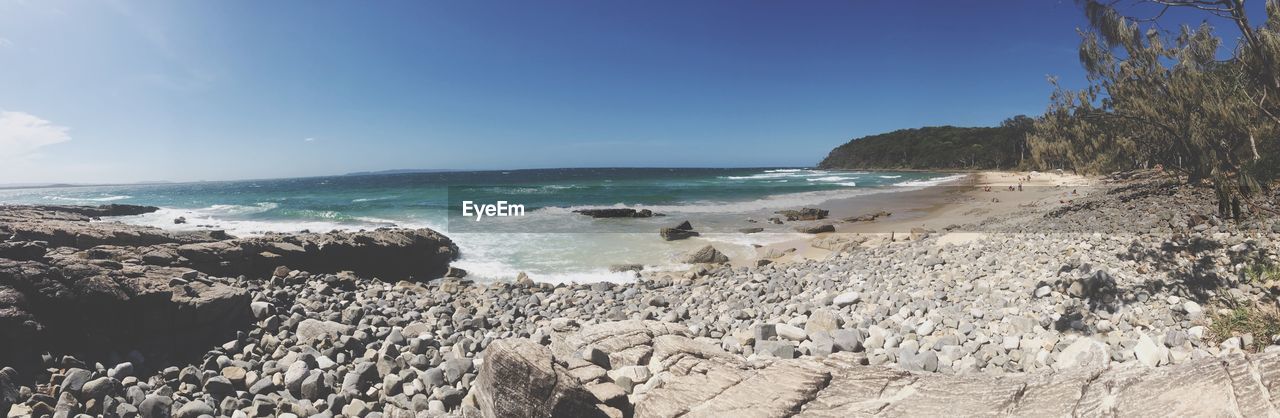 Panoramic view of beach against sky