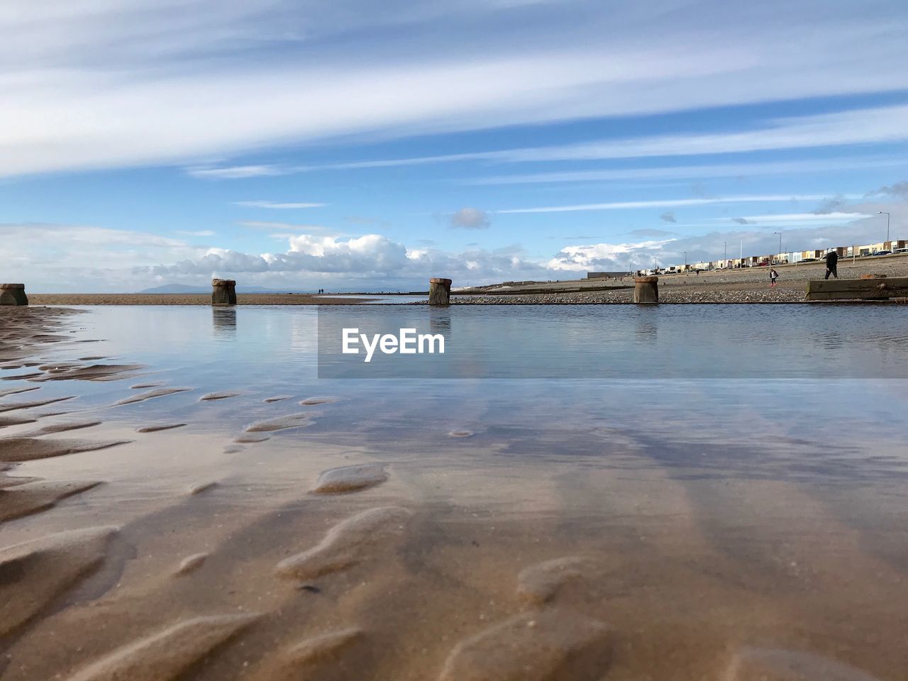 PIER ON SEA AGAINST SKY