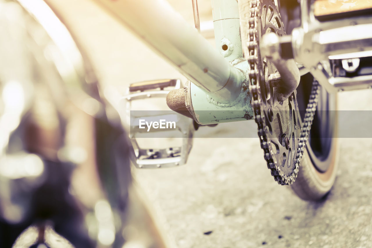 Close-up of bicycle on road