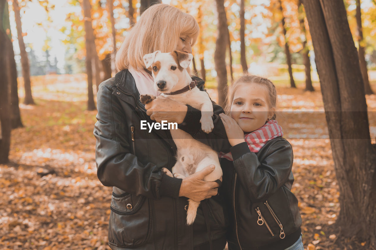 Portrait of woman with dog