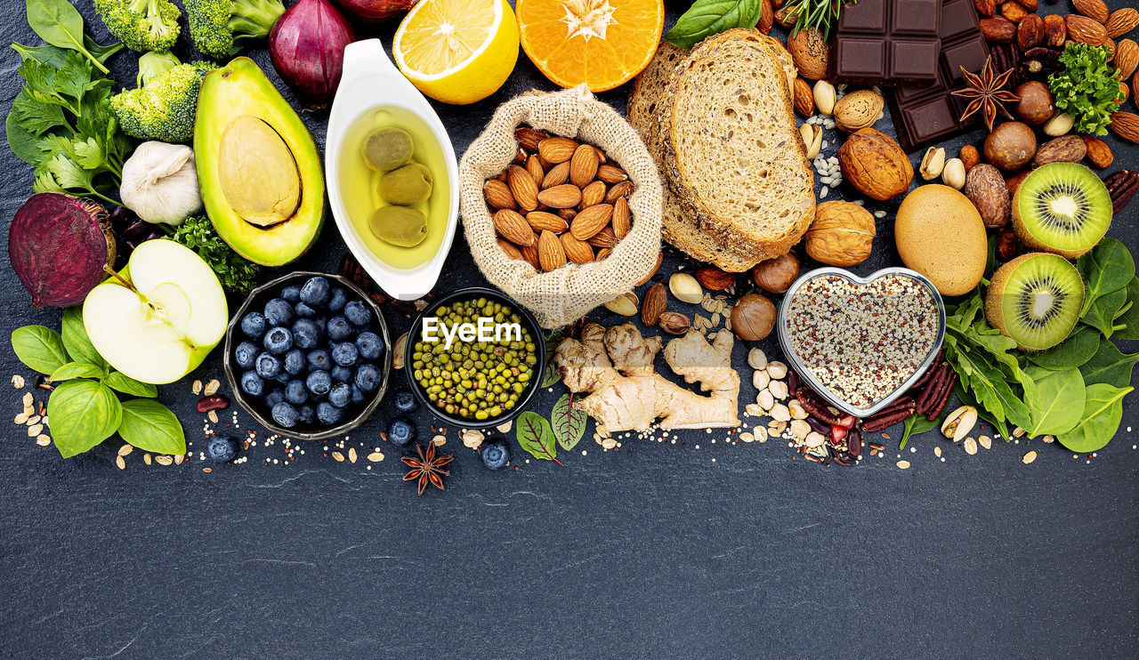 HIGH ANGLE VIEW OF VARIOUS FRUITS IN BOWL AT HOME