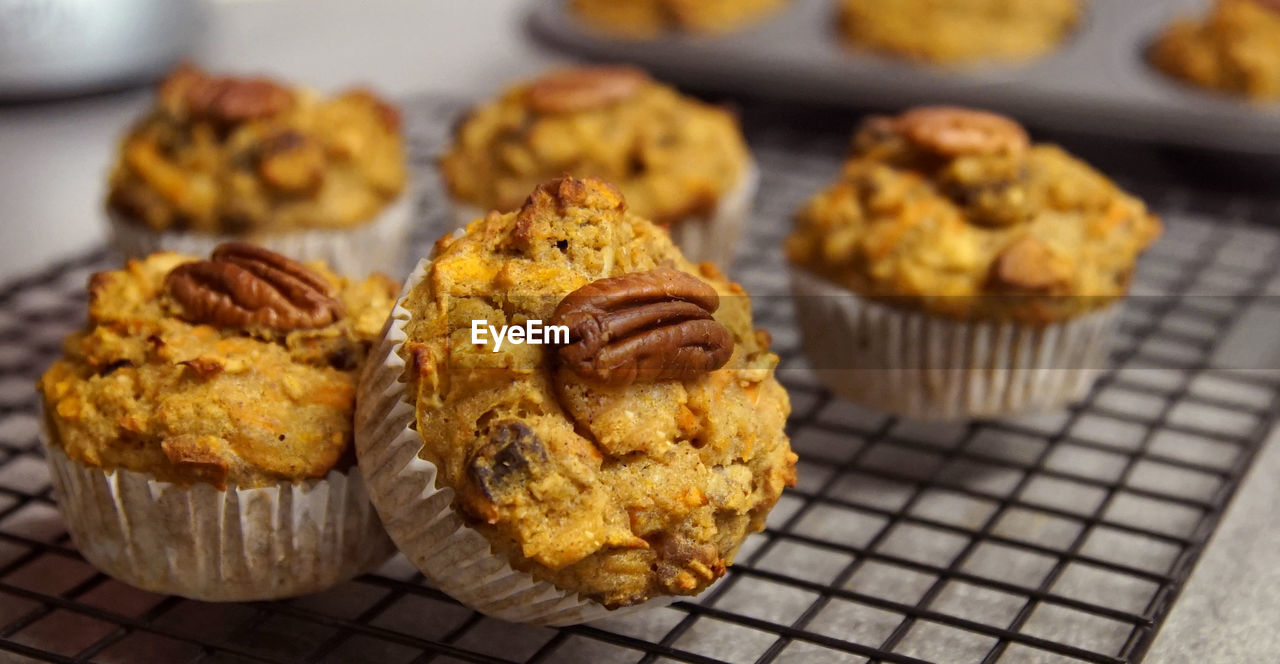 Close-up of muffins on cooling rack