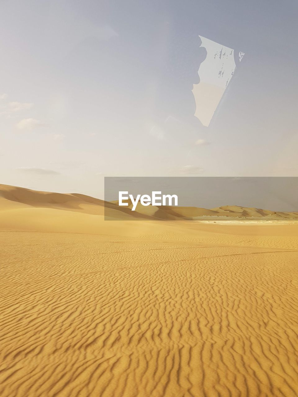 Scenic view of desert against sky