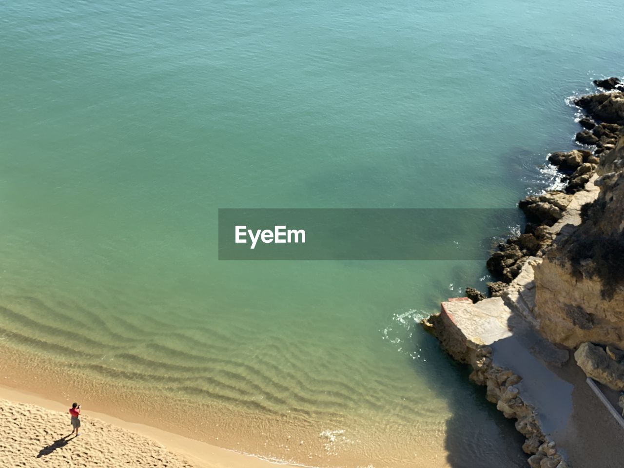 HIGH ANGLE VIEW OF SEA SHORE