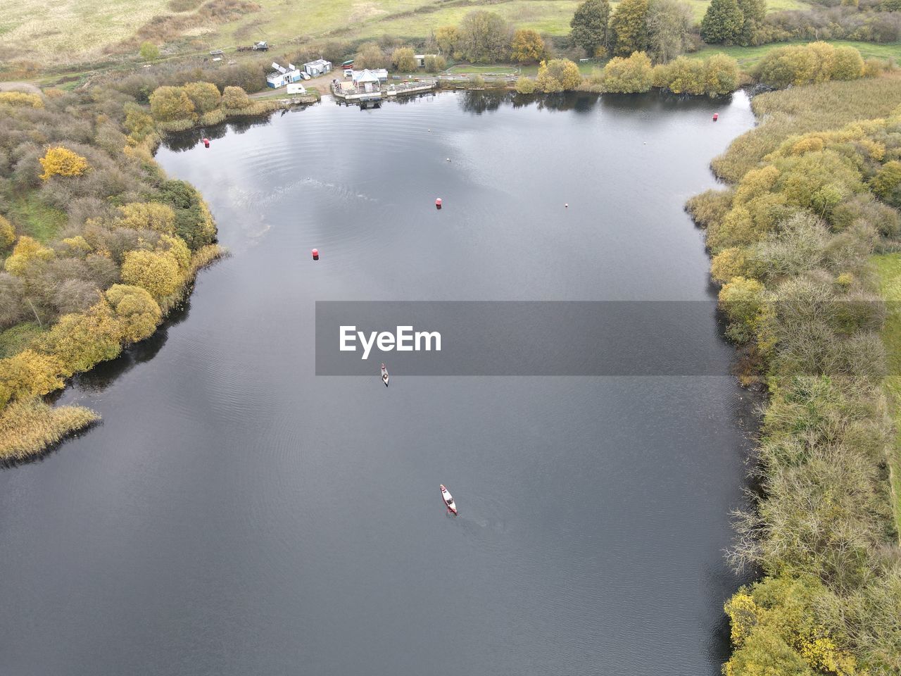 HIGH ANGLE VIEW OF LAKE AND TREES