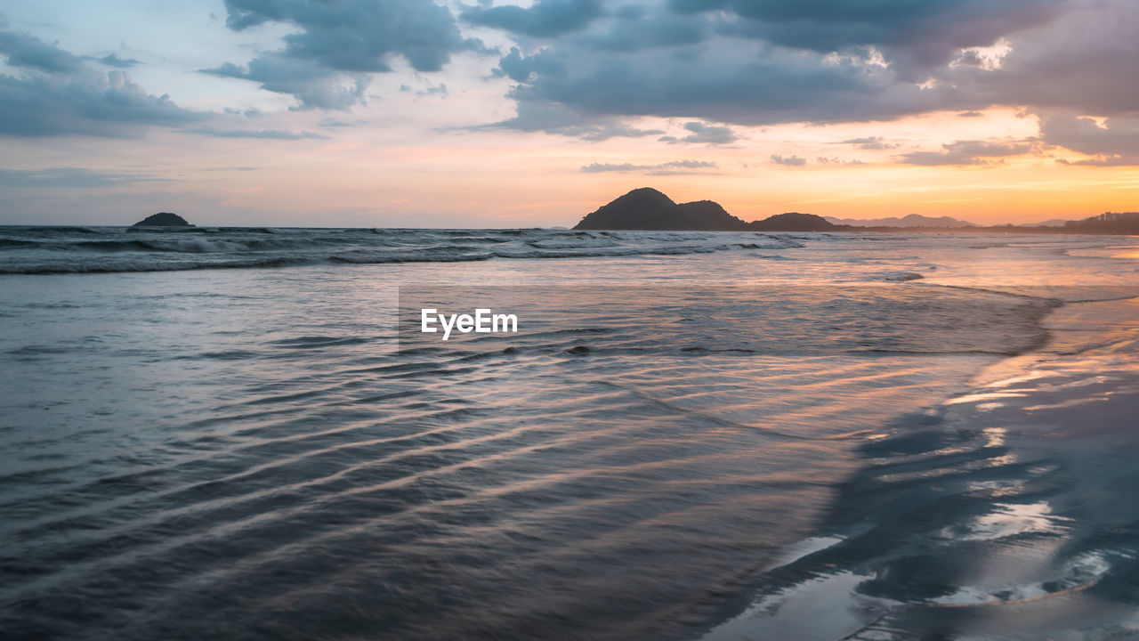 Beautiful sunset at the beach of bertioga, são paulo, brazil.