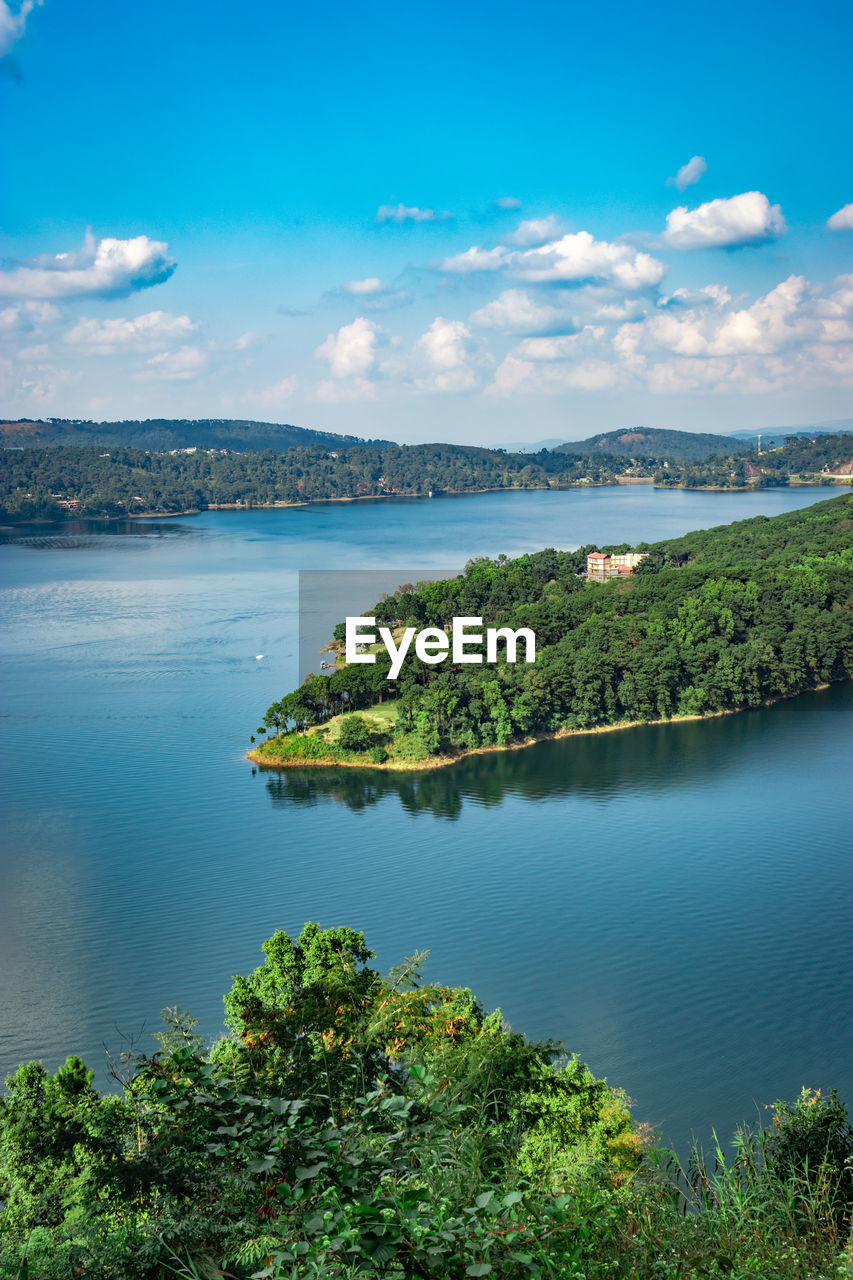 Serene lake with mountain background at day from top angle