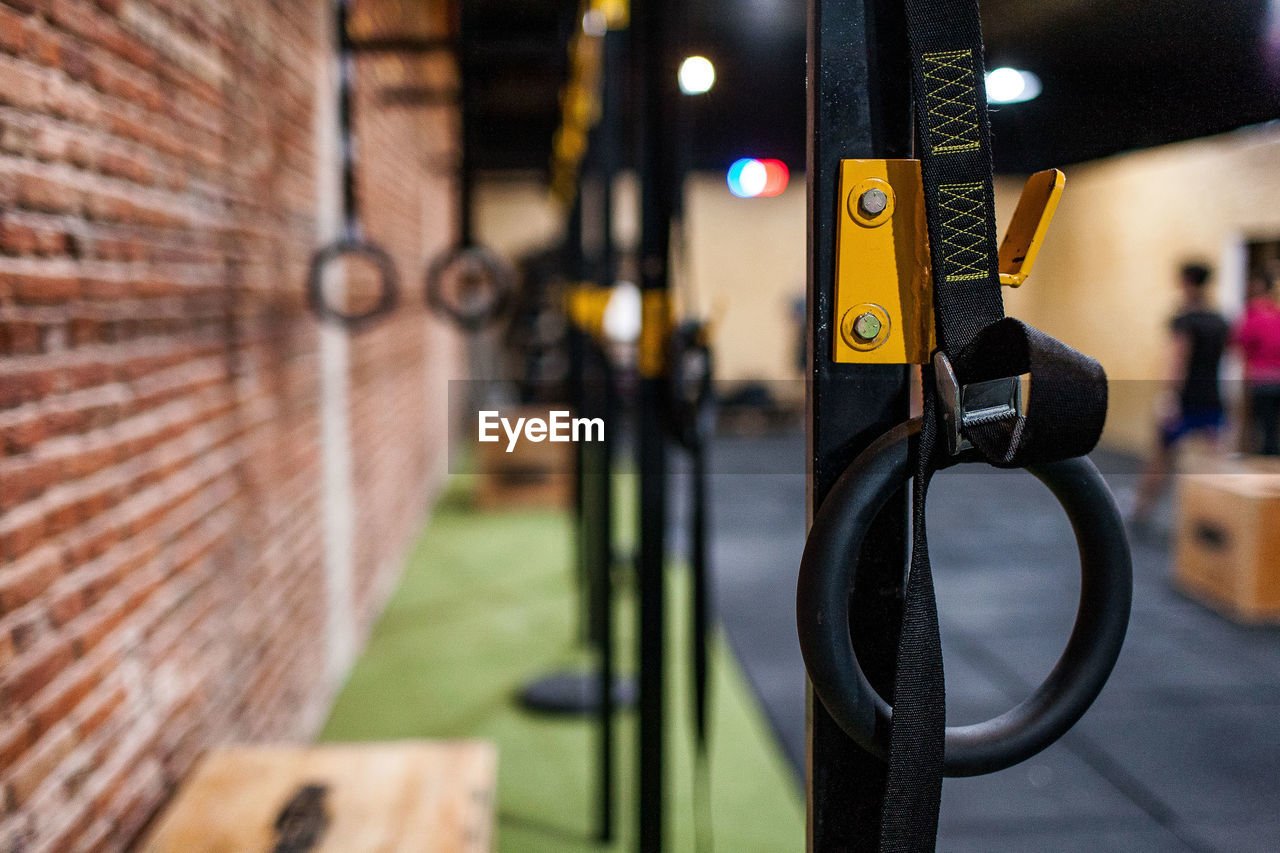 Close-up of gymnastic rings at health club