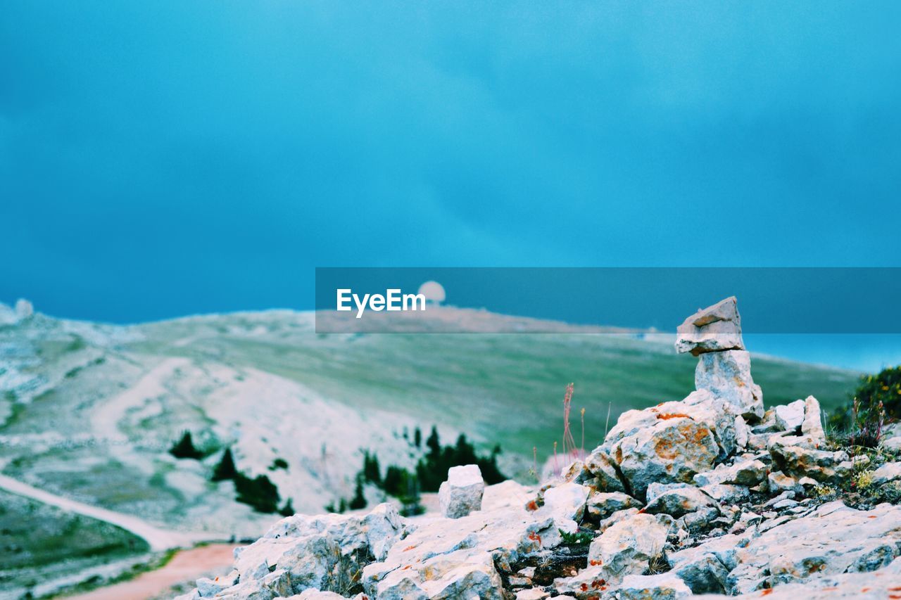 Close-up of landscape against sky