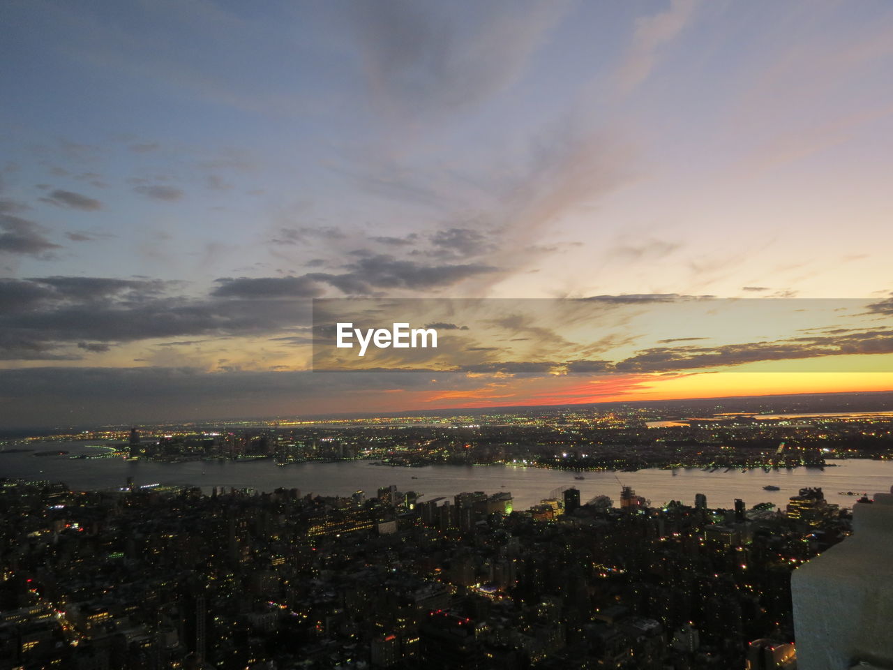 CITYSCAPE AGAINST SKY DURING SUNSET