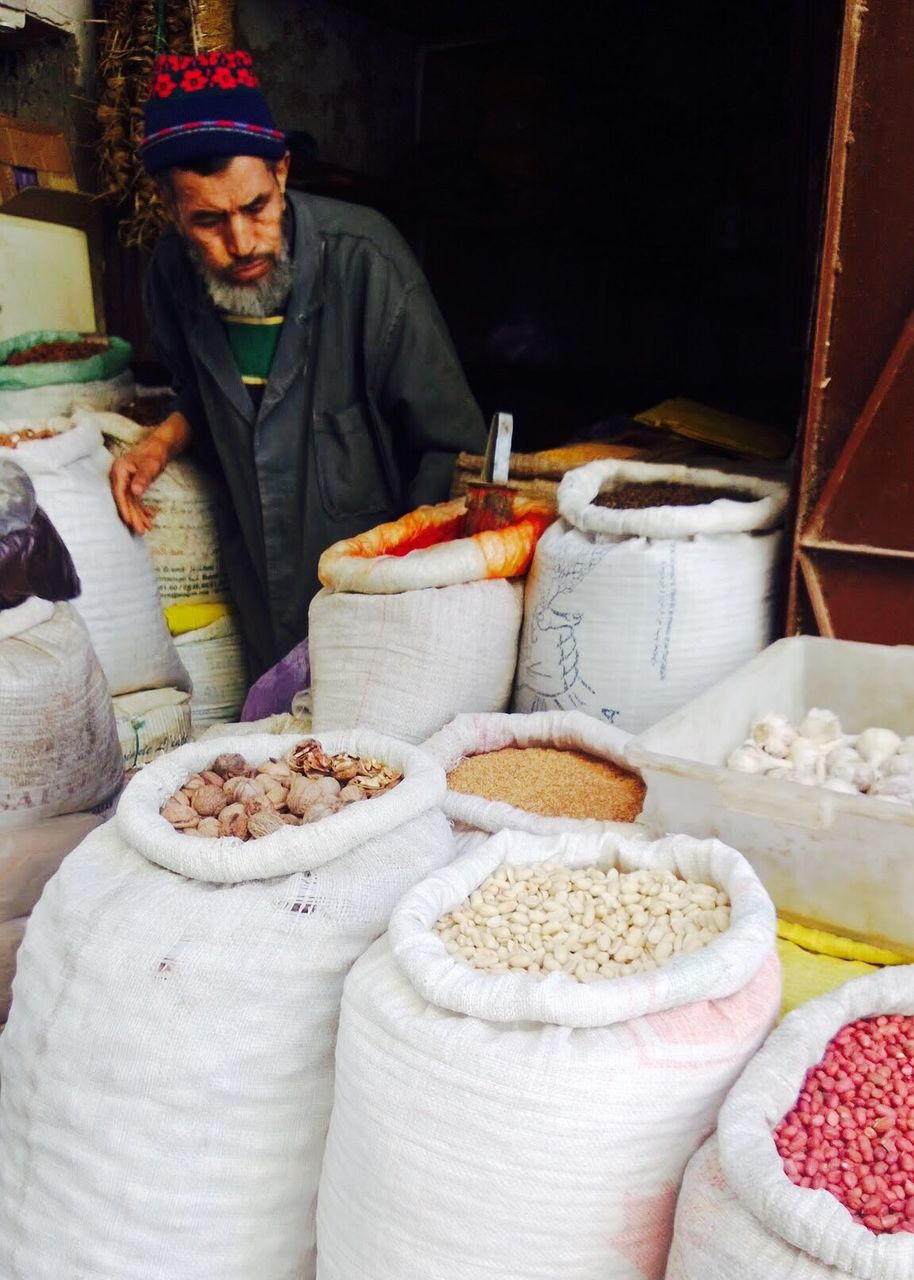 PERSON HOLDING FOOD