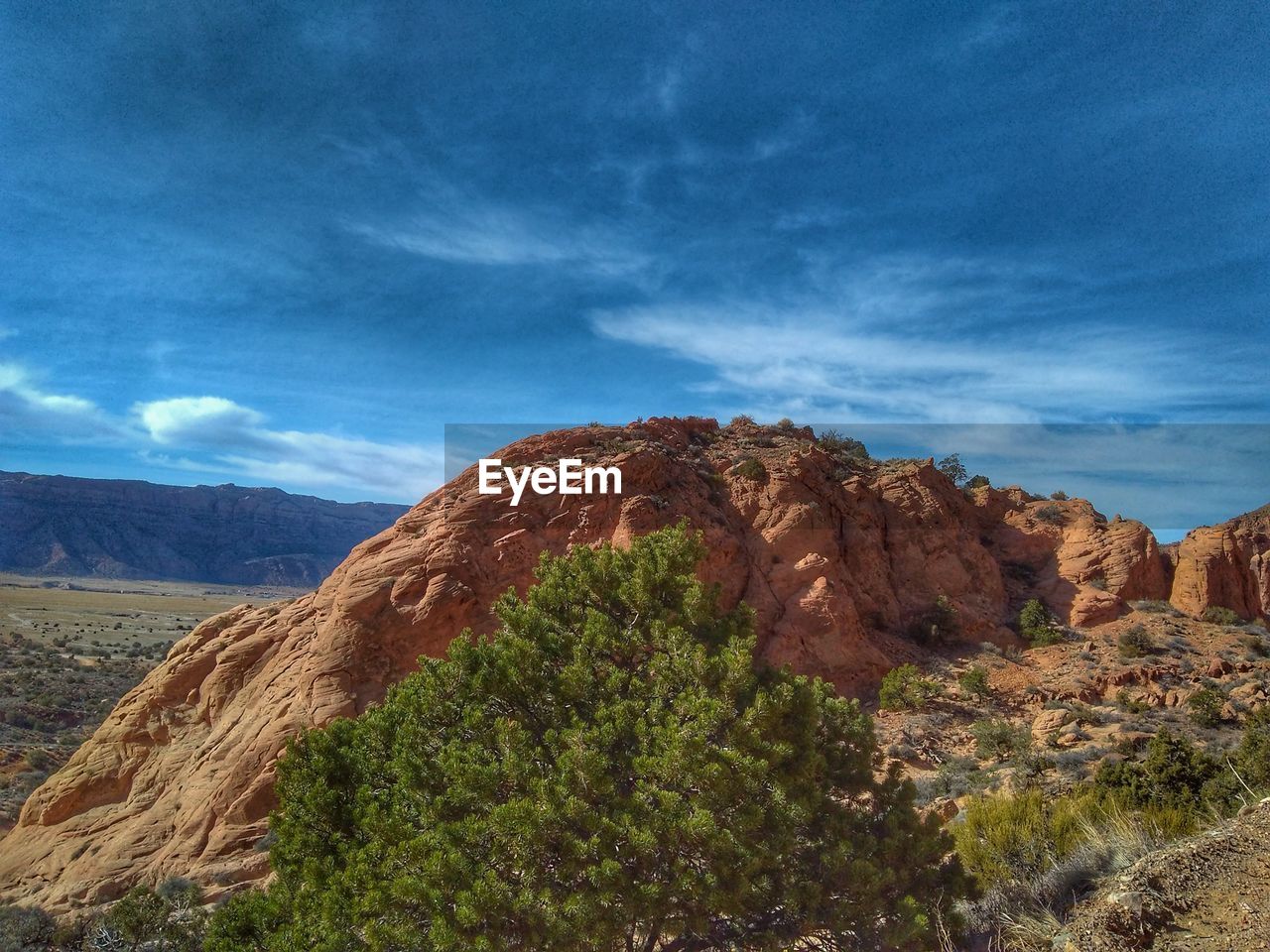 SCENIC VIEW OF MOUNTAIN AGAINST SKY