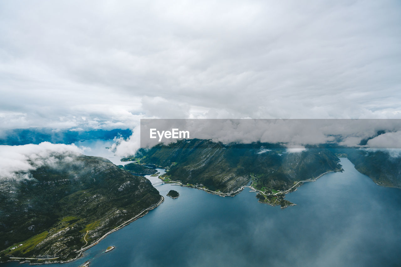 Aerial view of mountain by sea