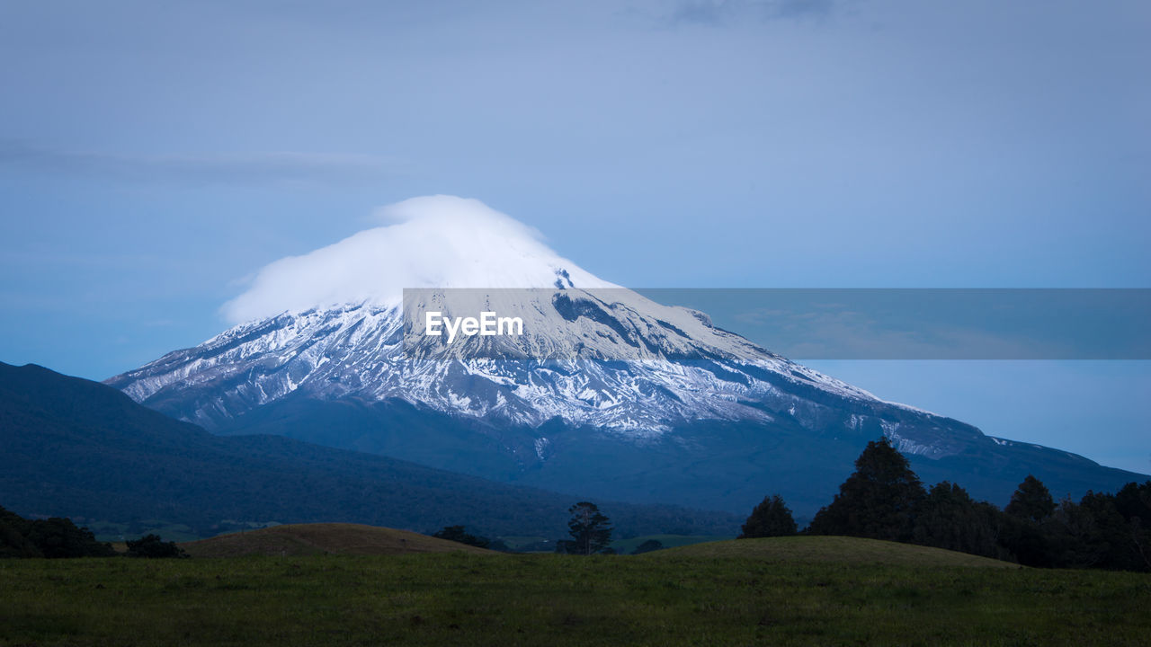 SNOWCAPPED MOUNTAINS AGAINST SKY