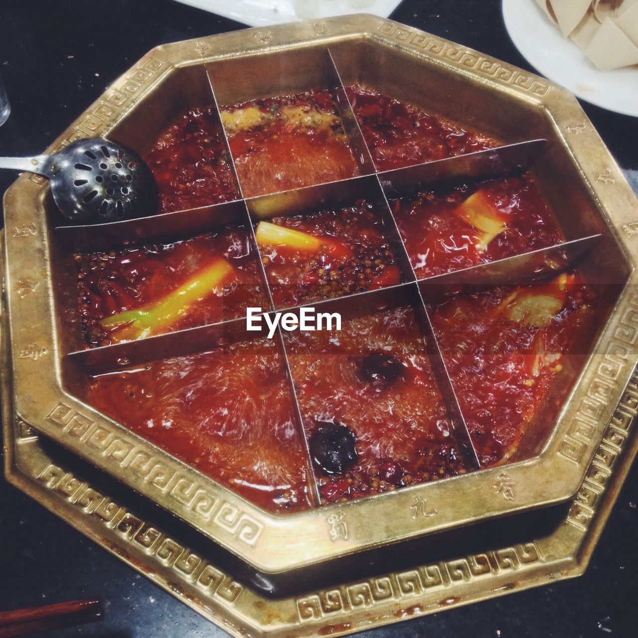 High angle view of gravy served on table