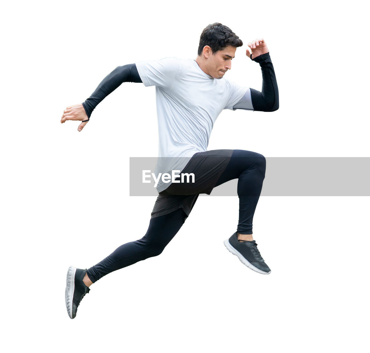 FULL LENGTH OF YOUNG MAN LOOKING AT WHITE BACKGROUND