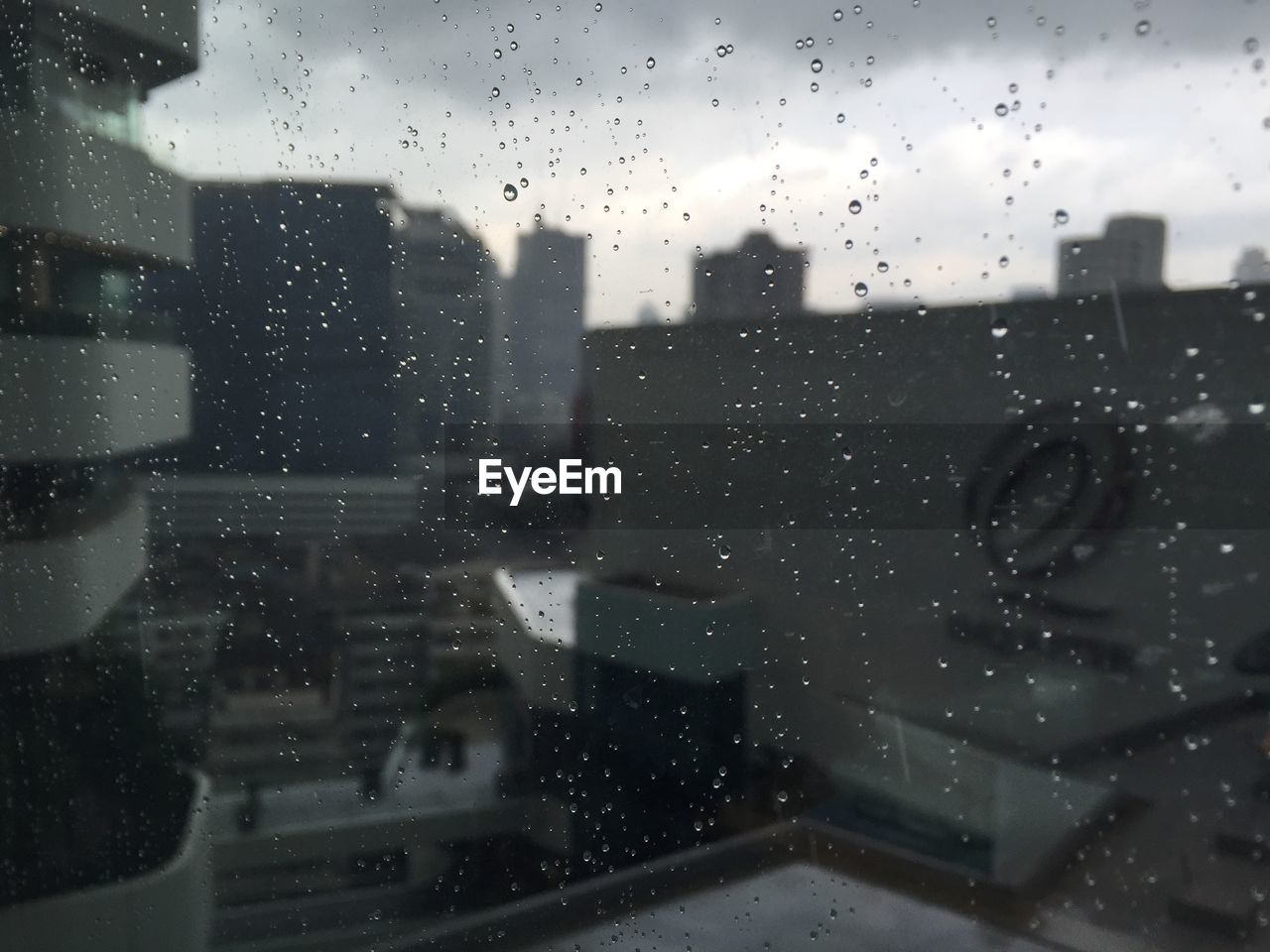 RAINDROPS ON GLASS WINDOW