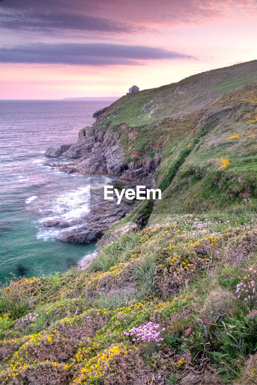 Scenic view of sea against sky during sunset