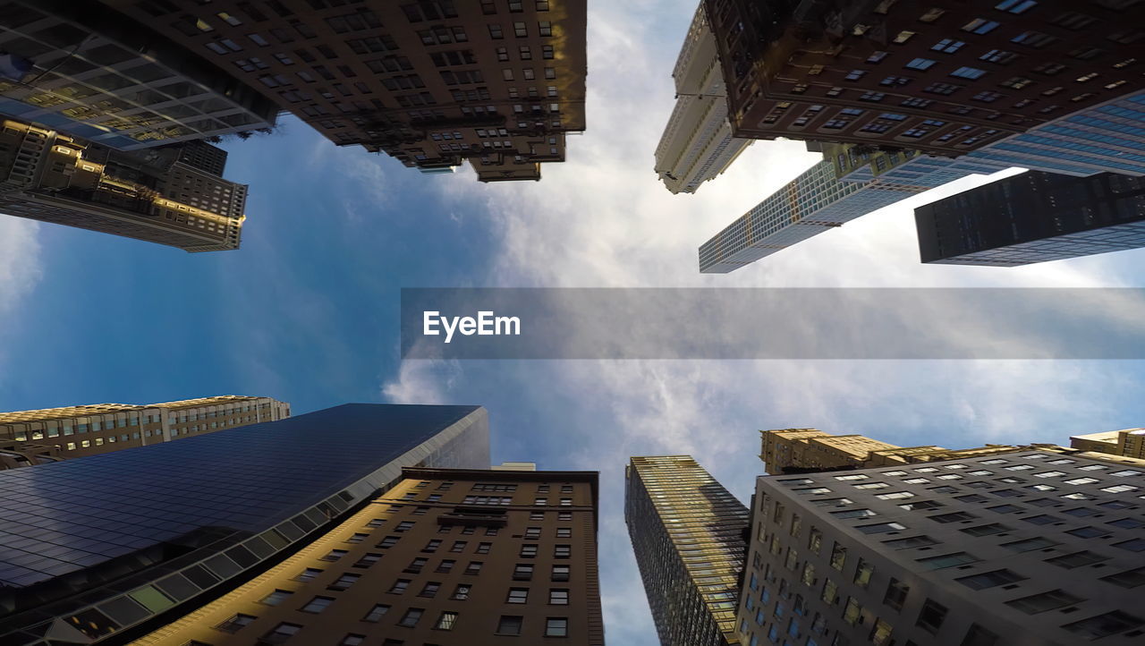 Aerial view of modern buildings against sky during sunset,manhattan, new york city