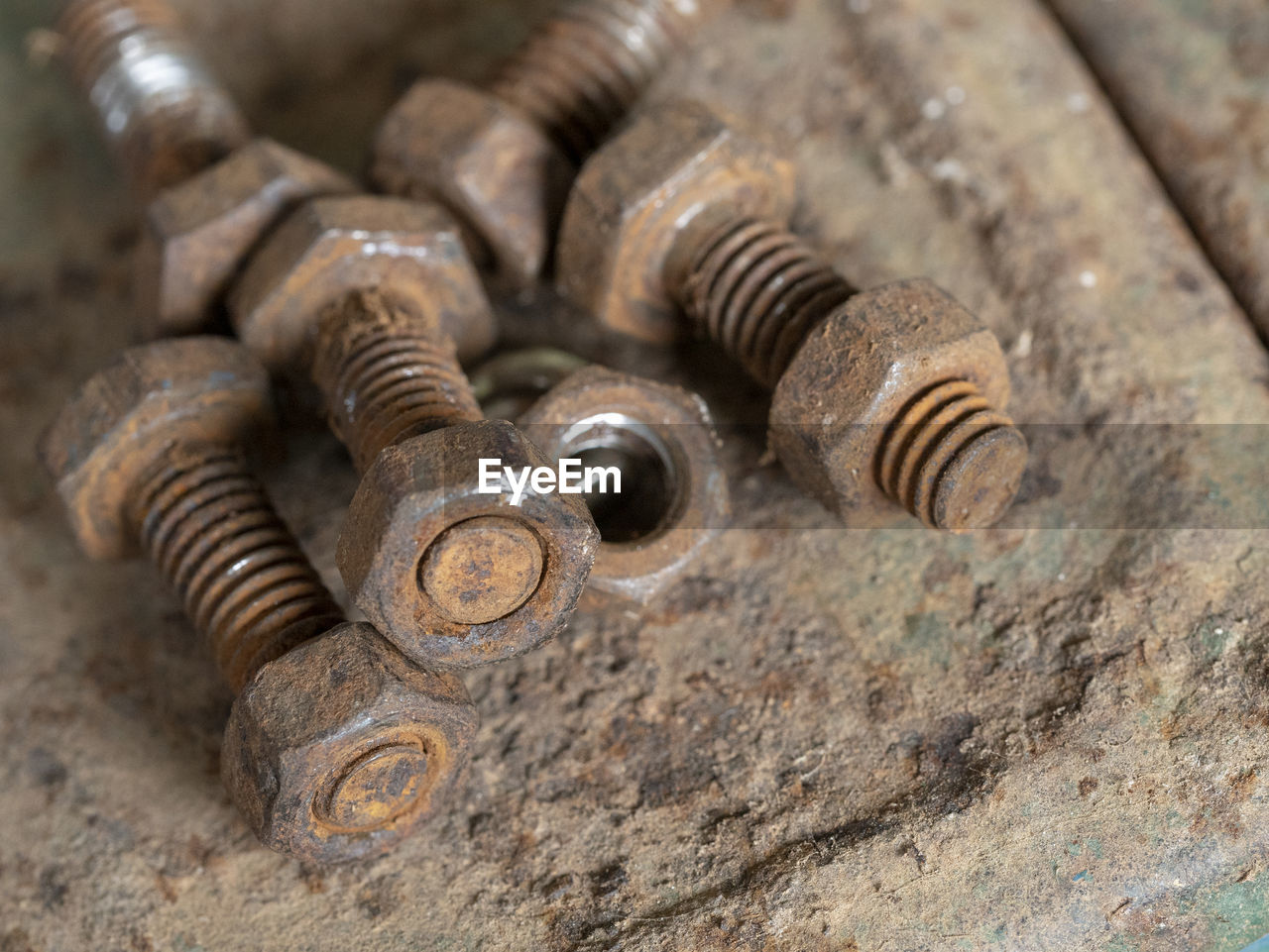 High angle view of rusty nut bolts