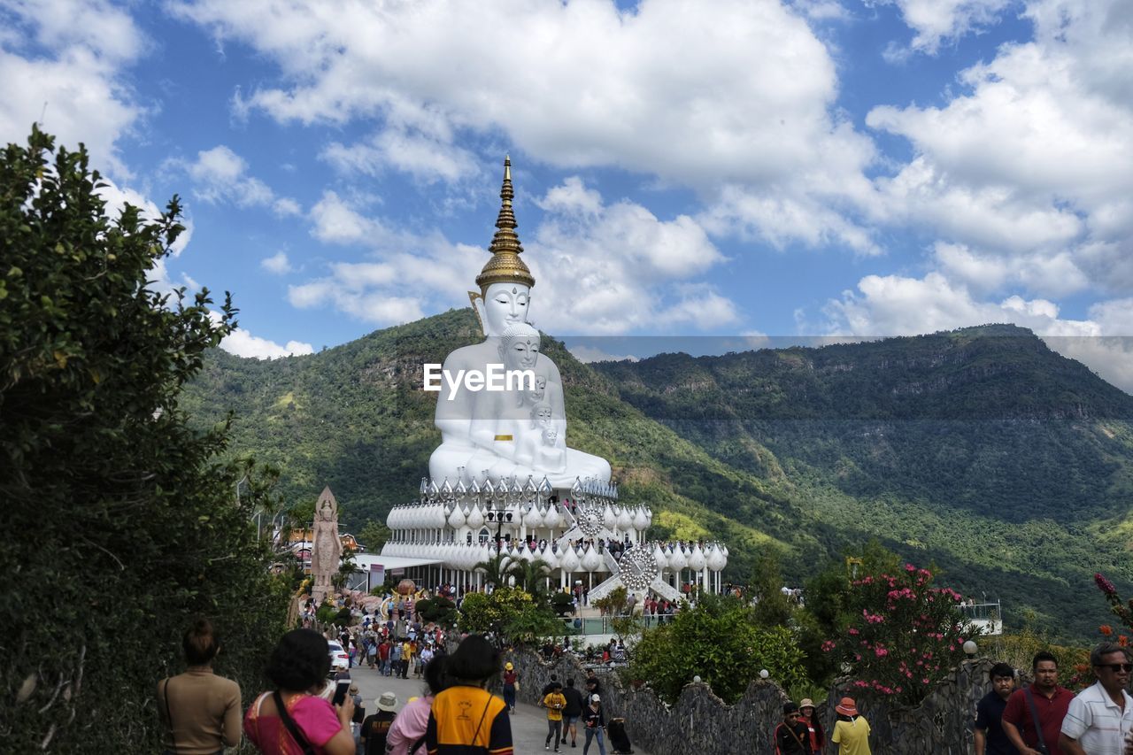 Statue of temple against cloudy sky