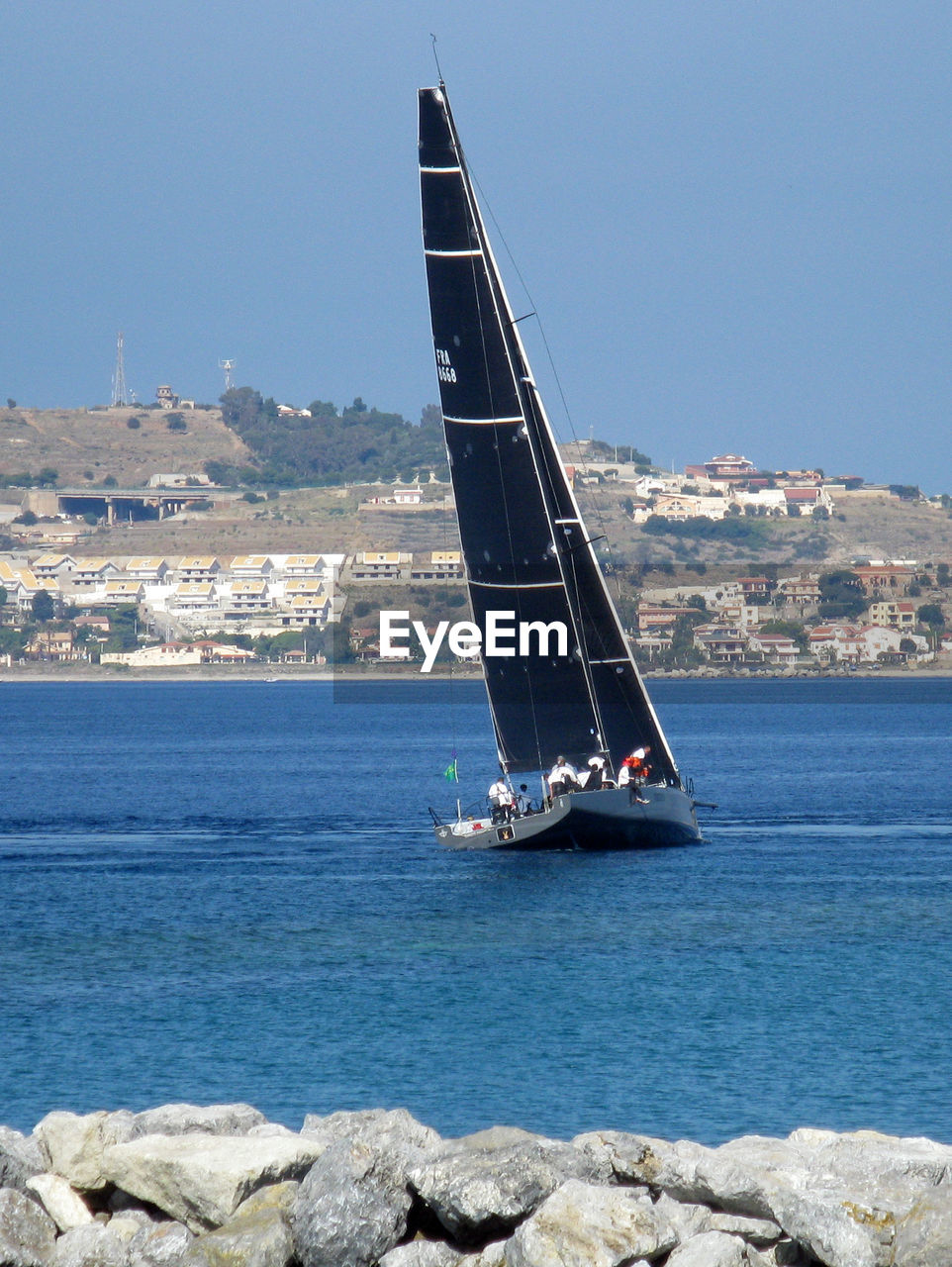 SAILBOATS SAILING ON SEA AGAINST SKY