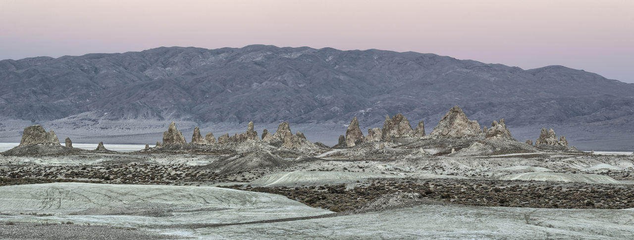 Scenic view of rock formation at desert against sky