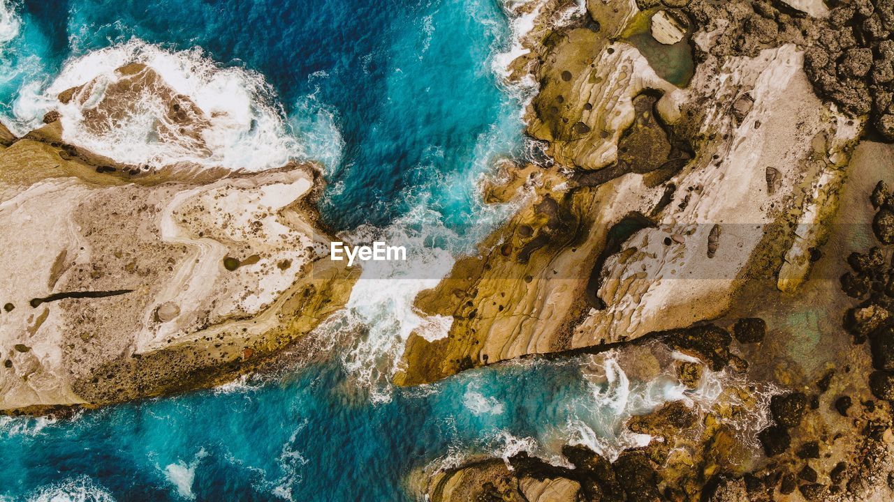 High angle view of rocks on beach