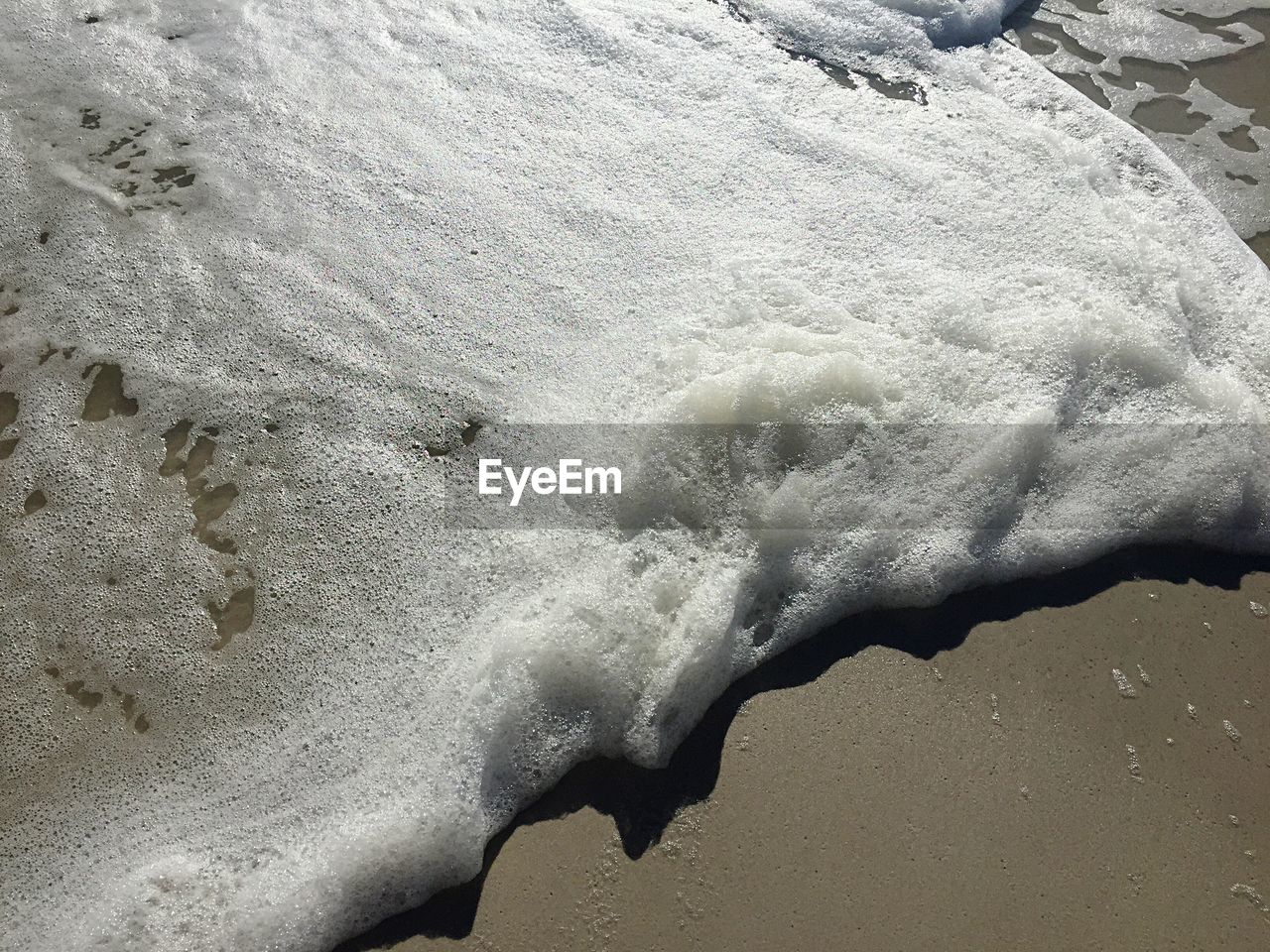 Close-up of wave rushing towards shore